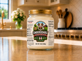 Jar of Condensable milk on a kitchen counter with a cow illustration on the label.