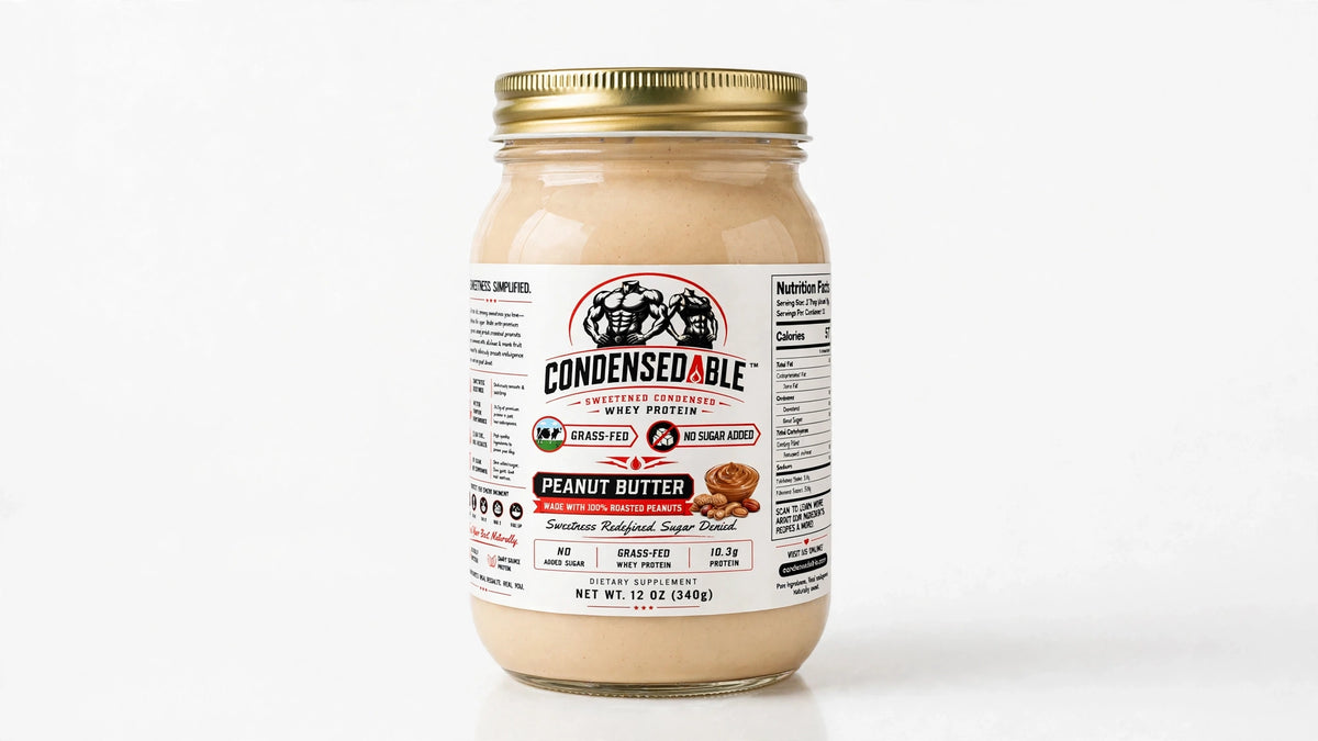 A glass jar of Condensedable Brand Condensed Peanut Butter with a gold metal lid and a white label, set against a plain white background.
