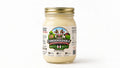 A glass jar of Condensedable Creamery Sweet Ginger Condensed Milk with a gold metal lid and a detailed label, set against a plain white background.
